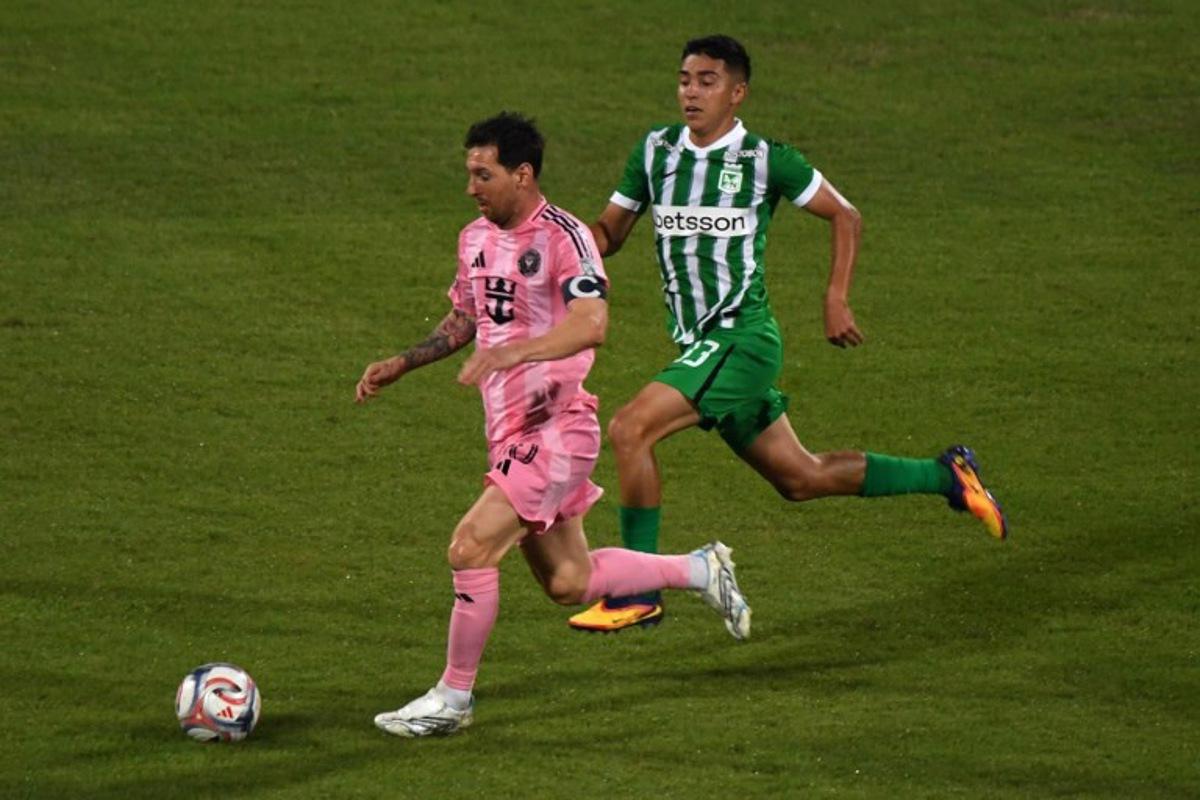Inter Miami's Argentine forward #10 Lionel Messi and Atletico Nacional's defender #33 Royer Caicedo fight for the ball during the friendly football match between Colombia's Atletico Nacional and the US' Inter Miami at the Atanasio Girardot Stadium in Medellin, Colombia, on January 31, 2026. Jaime SALDARRIAGA / AFP