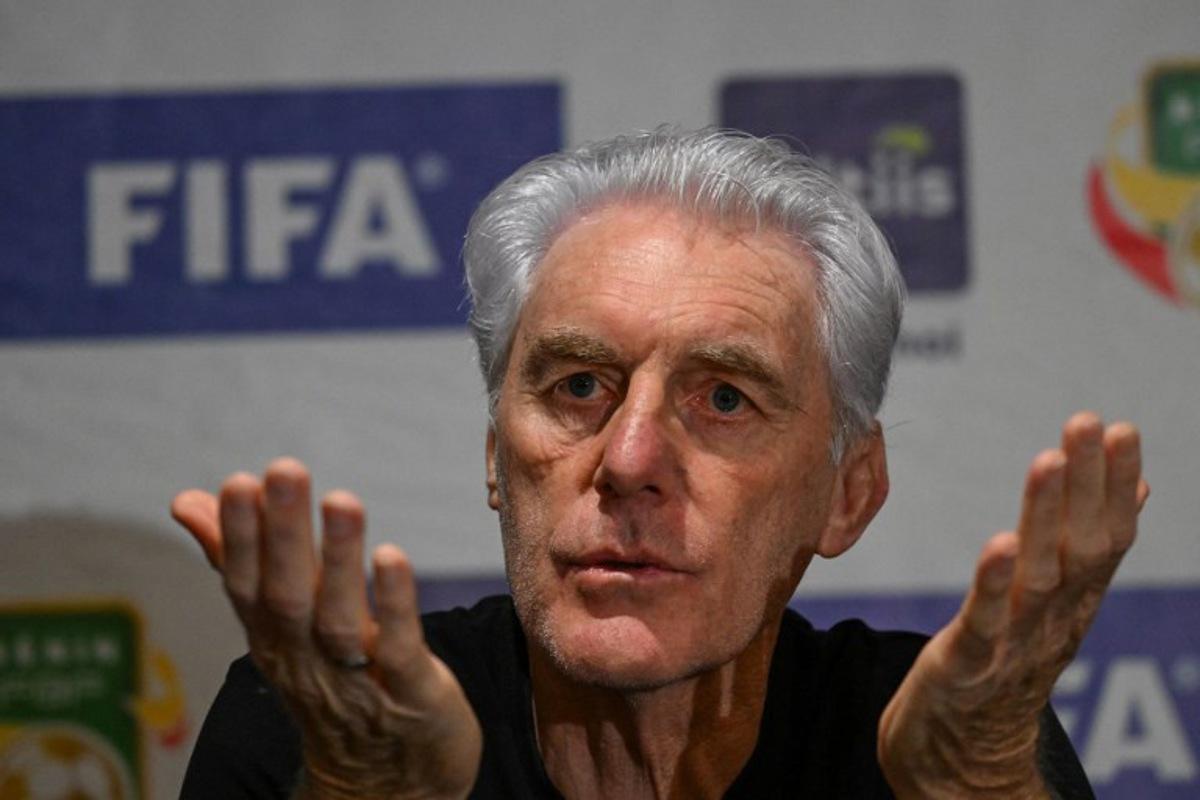 South Africa's coach Hugo Broos gestures during a press conference ahead of FIFA World Cup 2026 Africa group qualifier football match between Sout Africa and Benin in Abidjan on March 24, 2025. Issouf SANOGO / AFP