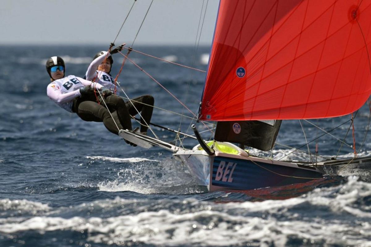 Belgium's duo Isaura Maenhaut and Anouk Geurts compete in Race 7 of the women's 49erFX skiff event during the Paris 2024 Olympic Games sailing competition at the Roucas-Blanc Marina in Marseille on July 30, 2024. NICOLAS TUCAT / AFP