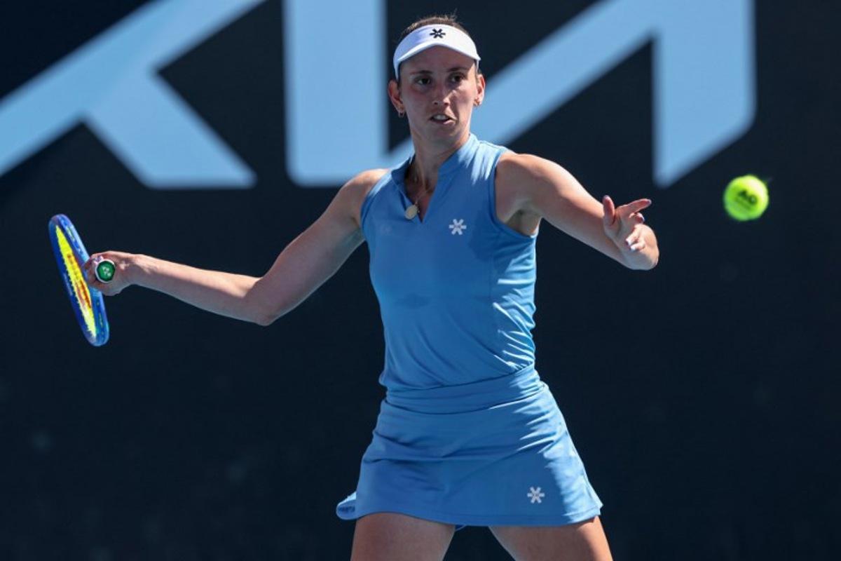 Belgium's Elise Mertens hits a shot against Japan's Moyuka Uchijima during their women's singles match on day five of the Australian Open tennis tournament in Melbourne on January 22, 2026. IZHAR KHAN / AFP