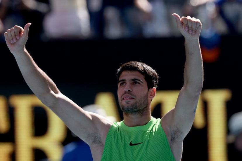 Spain's Carlos Alcaraz celebrates victory over USA's Tommy Paul after their men's singles match on day eight of the Australian Open tennis tournament in Melbourne on January 25, 2026. DAVID GRAY / AFP
