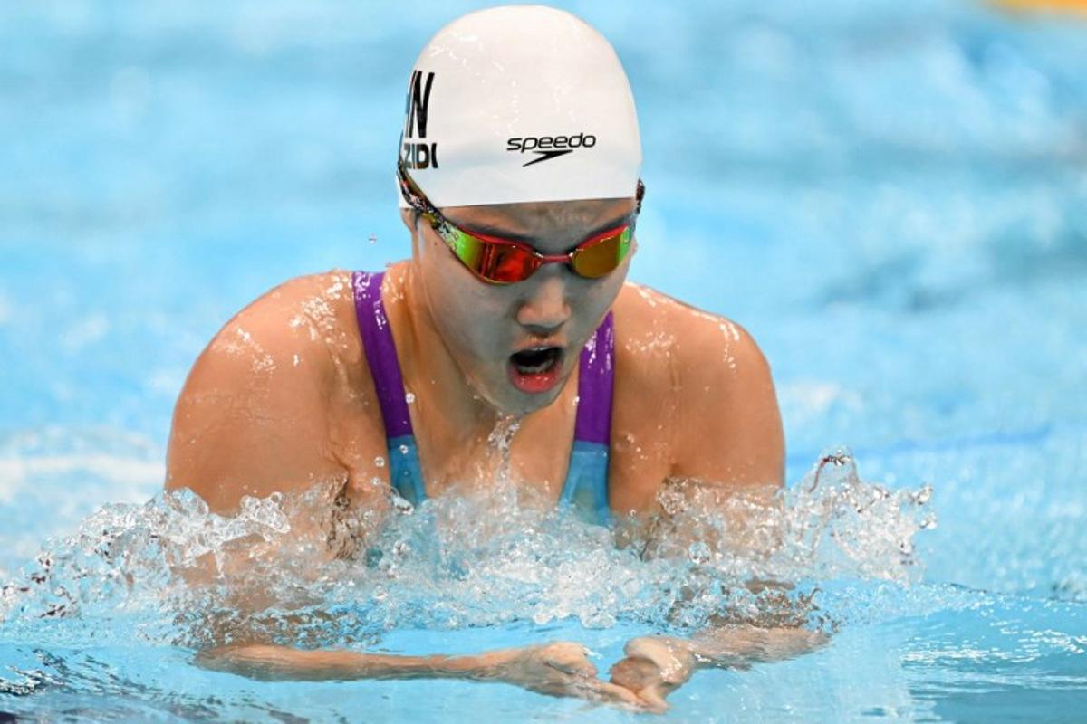 China's Yu Zidi competes in the final of the women's 200m individual medley swimming event during the 2026 Asian Games at the Tokyo Aquatics Centre in Tokyo on September 21, 2026. ANDREW CABALLERO-REYNOLDS / AFP